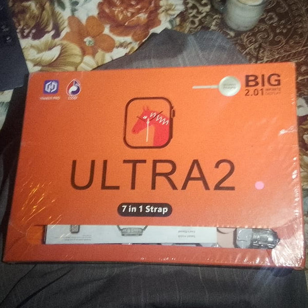 Ultra Smart Watch with 7 Silicone Straps – Stylish & Comfortable Everyday Wear packaging in orange box with strap preview